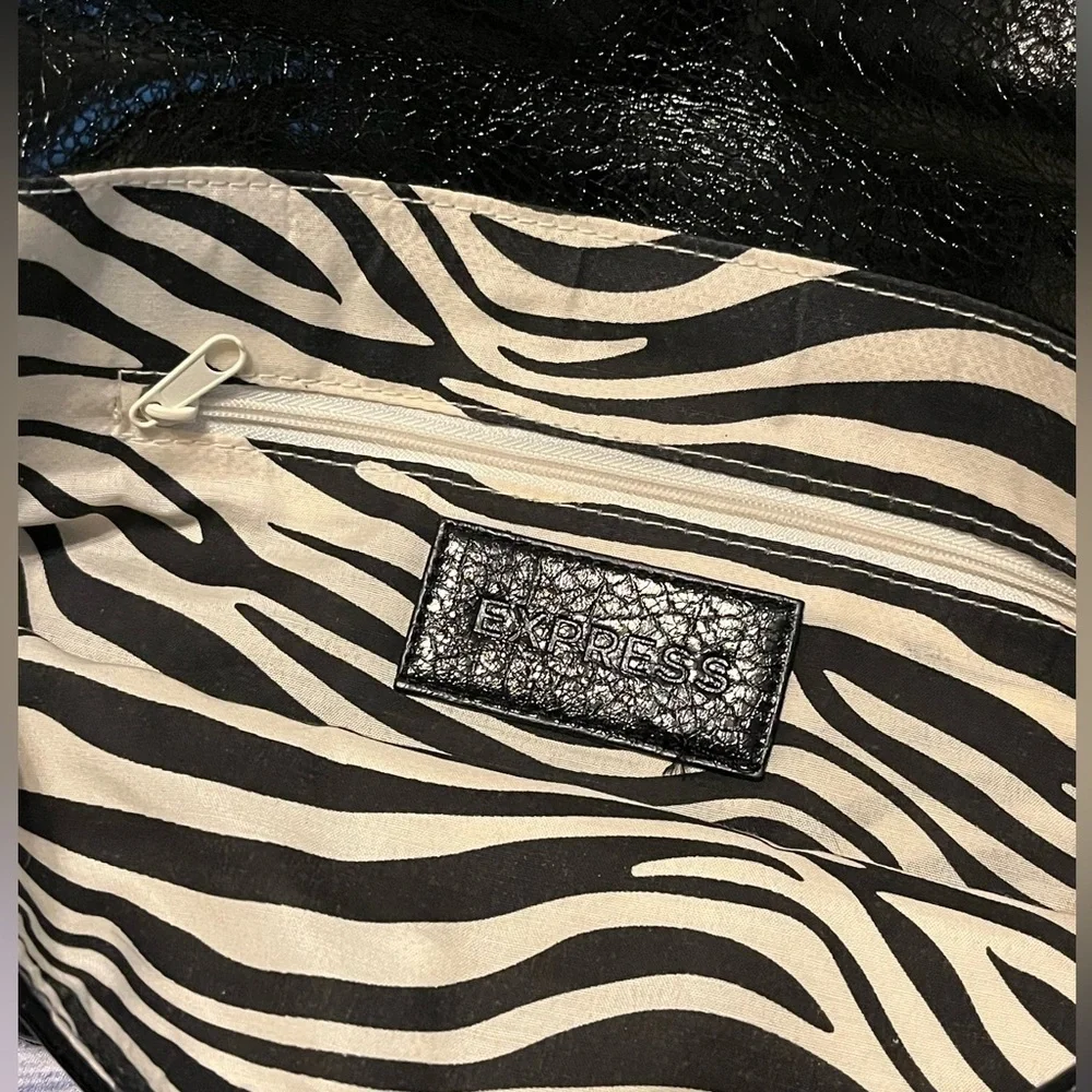 Express Black faux leather envelope clutch, with zebra pattern lining